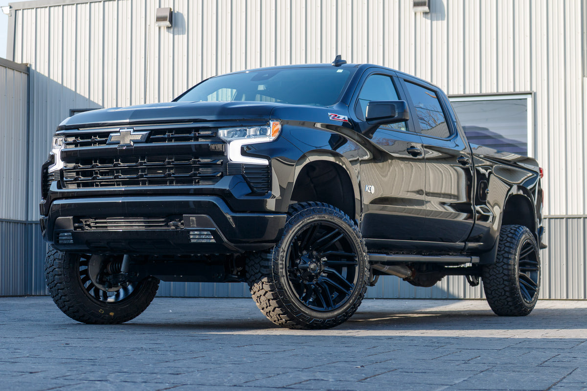 2024 Chevrolet Silverado 1500 RST with a 6" Rough Country lift kit, 22x12 Fuel Typhoon wheels, and 35" Fury Country Hunter R/T tires.
