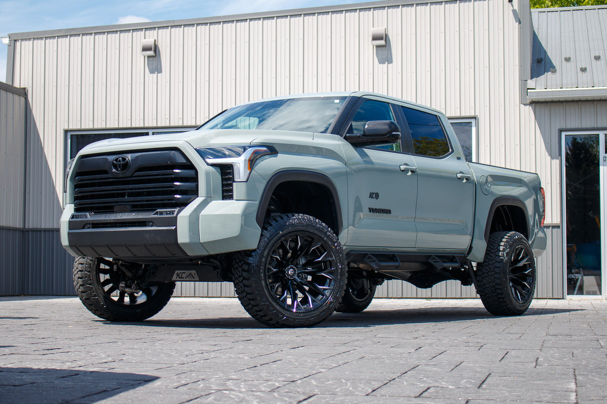 2024 Toyota Tundra SR with a 6" Rough Country lift kit, 22x12 Fuel Flame wheels, and 35" Fury Country Hunter R/T tires.