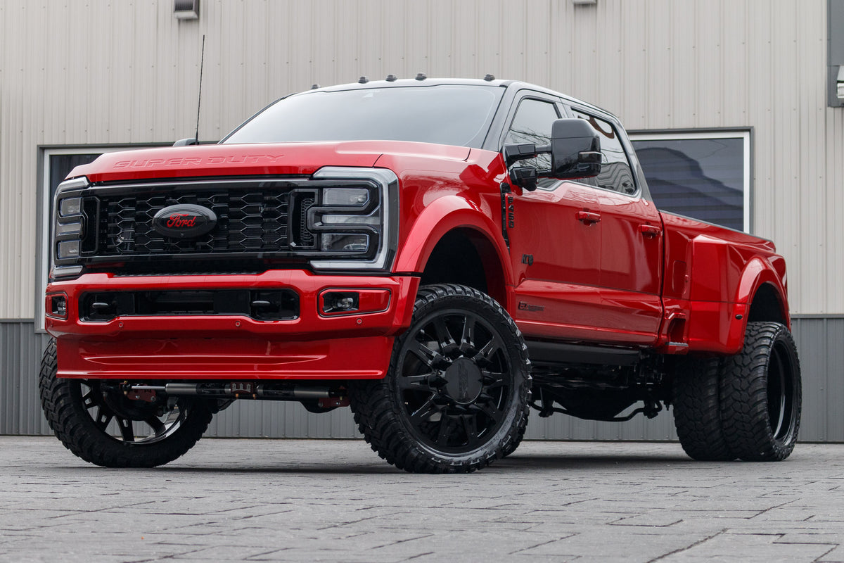 2024 Ford F-450 Super Duty Platinum with a 4" Wicked lift kit, JTX Avalon wheels, and 37" AMP Terrain Attack M/T A tires.