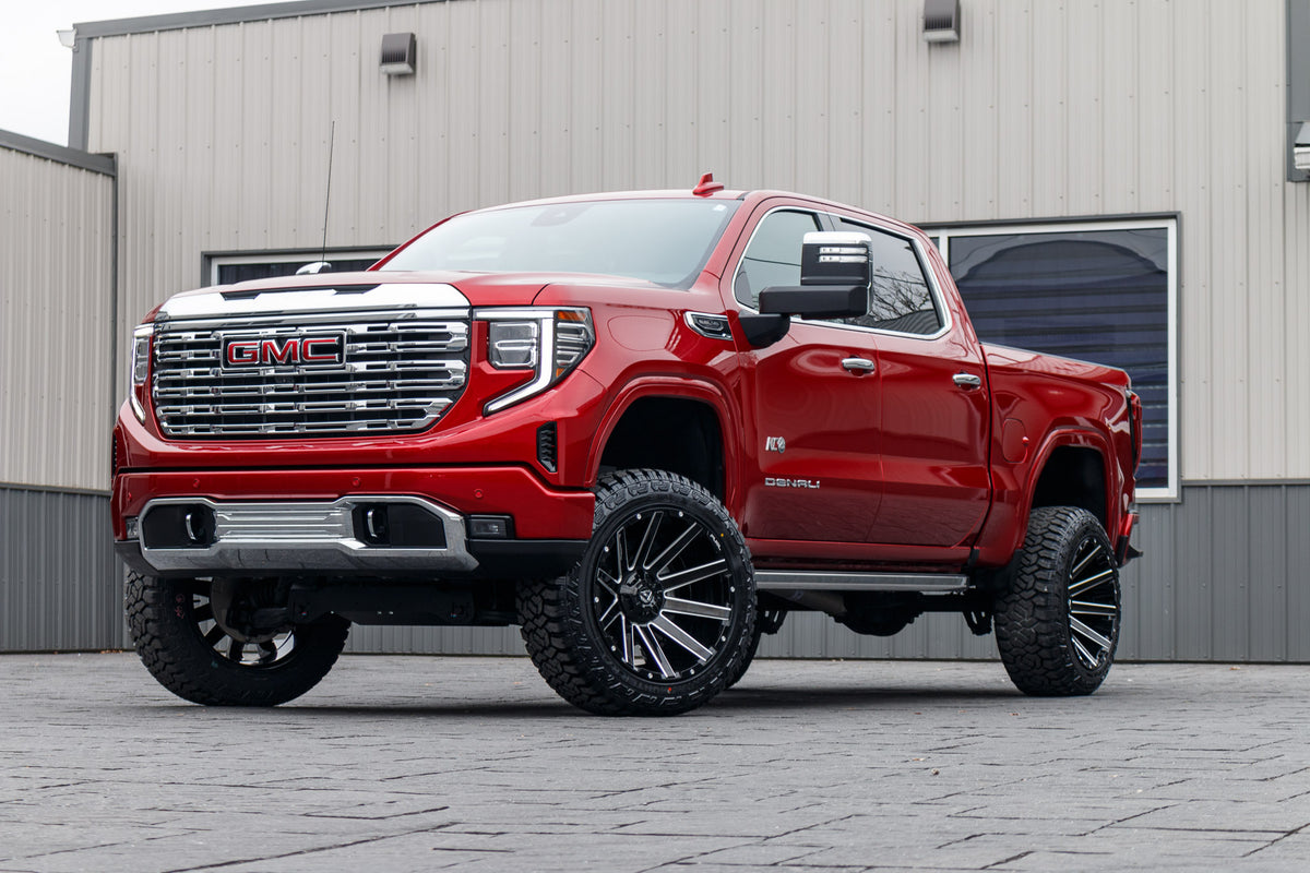 2024 GMC Sierra 1500 Denali with a 6" Rough Country suspension kit, 22x12 Fuel Contra wheels, and 35" Fury Country Hunter R/T tires.