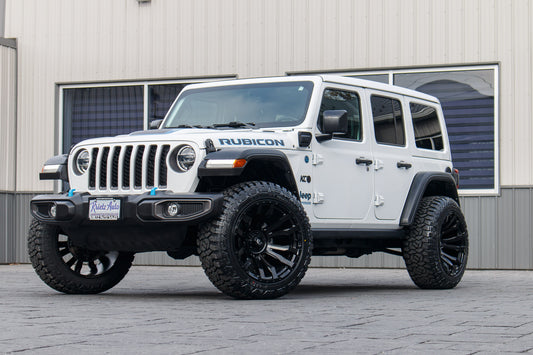 2021 Jeep Wrangler with Jeep Stock suspension, 22x12 Fuel Blitz wheels, and 35" Fury Country Hunter R/T tires.