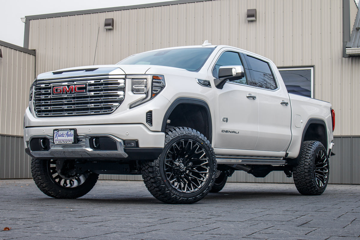 2024 GMC Sierra 1500 Denali with a 6" Rough Country suspension kit, 22x12 Fuel Strike wheels, and 35" Fury Country Hunter R/T tires.
