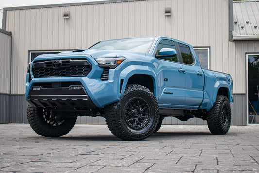 2026 Toyota Tacoma TRD Off-Road with a 3" ReadyLift lift kit, 18x9 Fuel Surge wheels, and 35" Avix Trailtek R/T tires.