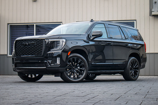 2024 GMC Yukon Denali with GMC Factory Suspension, 22x9 GMC Stock wheels, and Bridgestone Alenza tires.