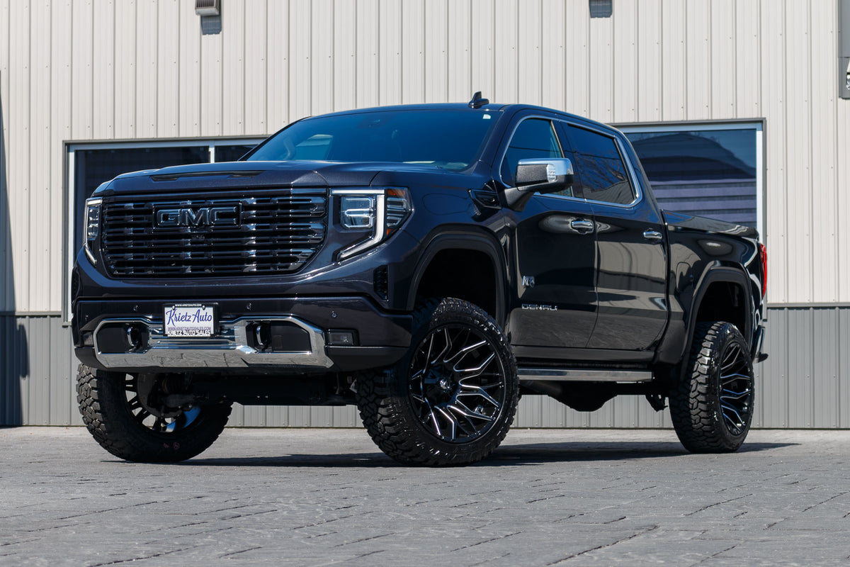 2024 GMC Sierra 1500 Denali Ultimate with a 6" Rough Country lift kit, 22x12 Fuel Twitch wheels, and 35" Fury Country Hunter R/T tires.