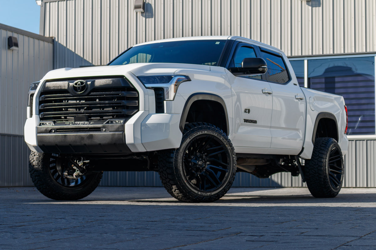 2025 Toyota Tundra SR5 with a 6" Rough Country lift kit, 22x12 Fuel Typhoon wheels, and 35" Fury Country Hunter R/T tires.