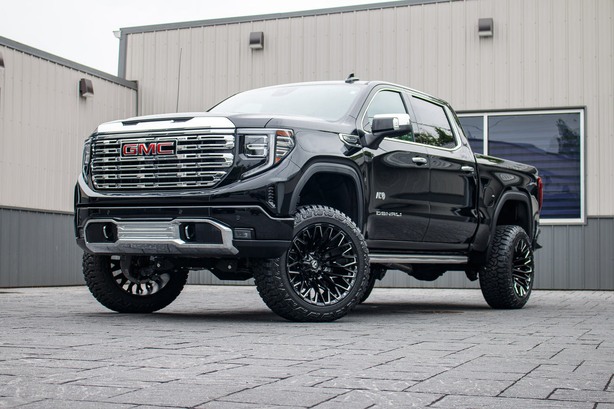 2026 GMC Sierra 1500 Denali with a 6" BDS lift kit, 22x12 Fuel Strike wheels, and 35" Fury Country Hunter R/T tires.