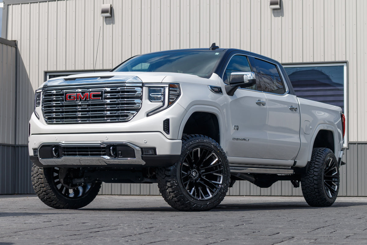 2023 GMC Sierra 1500 Denali with a 6" Rough Country lift kit, 22x12 Fuel Rebar wheels, and 35" Fury Country Hunter R/T tires.