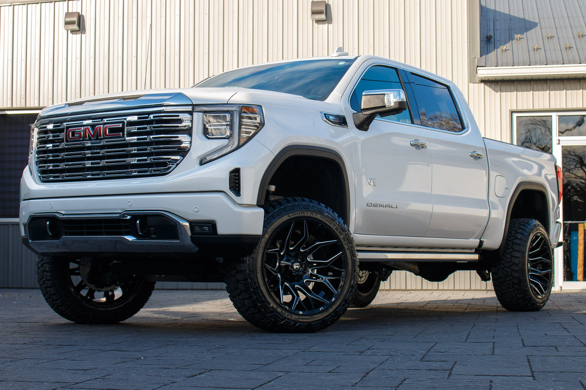 2024 GMC Sierra 1500 Denali with a 6" Rough Country suspension kit, 22x12 Fuel Twitch wheels, and 35" Fury Country Hunter R/T tires.