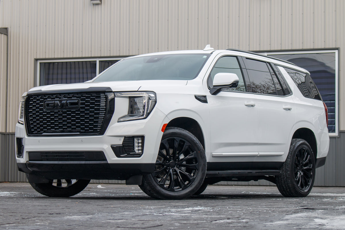 2023 GMC Yukon Denali with GMC Factory suspension, 22x9 GMC Stock wheels, and Bridgestone Alenza tires.