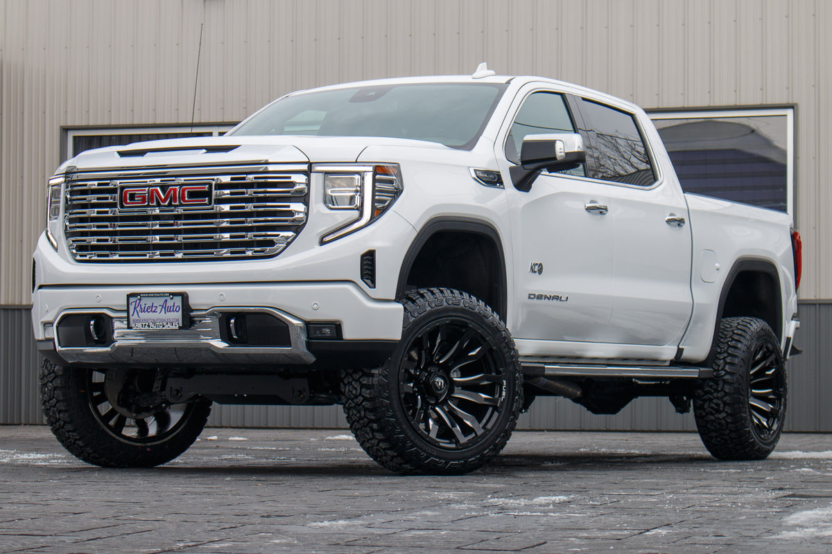 2024 GMC Sierra 1500 Denali with a 6" Rough Country suspension kit, 22x12 Fuel Blitz wheels, and 35" Fury Country Hunter R/T tires.