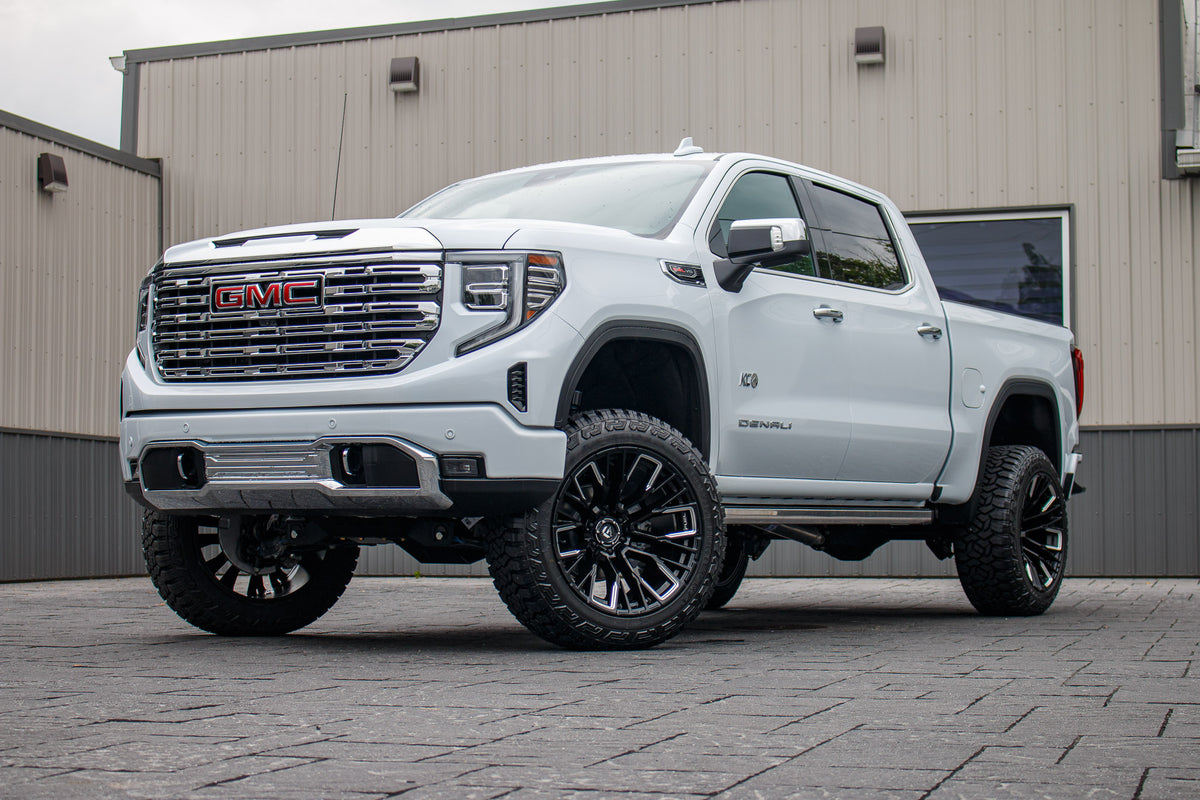 2026 GMC Sierra 1500 Denali with a 6" BDS lift kit, 22x12 Fuel Rebar wheels, and 35" Fury Country Hunter R/T tires.