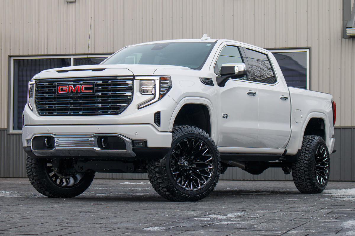 2024 Chevrolet Silverado 1500 High Country lift kit, 22x12 Fuel Rebar wheels, and 35" Fury Country Hunter R/T tires.
