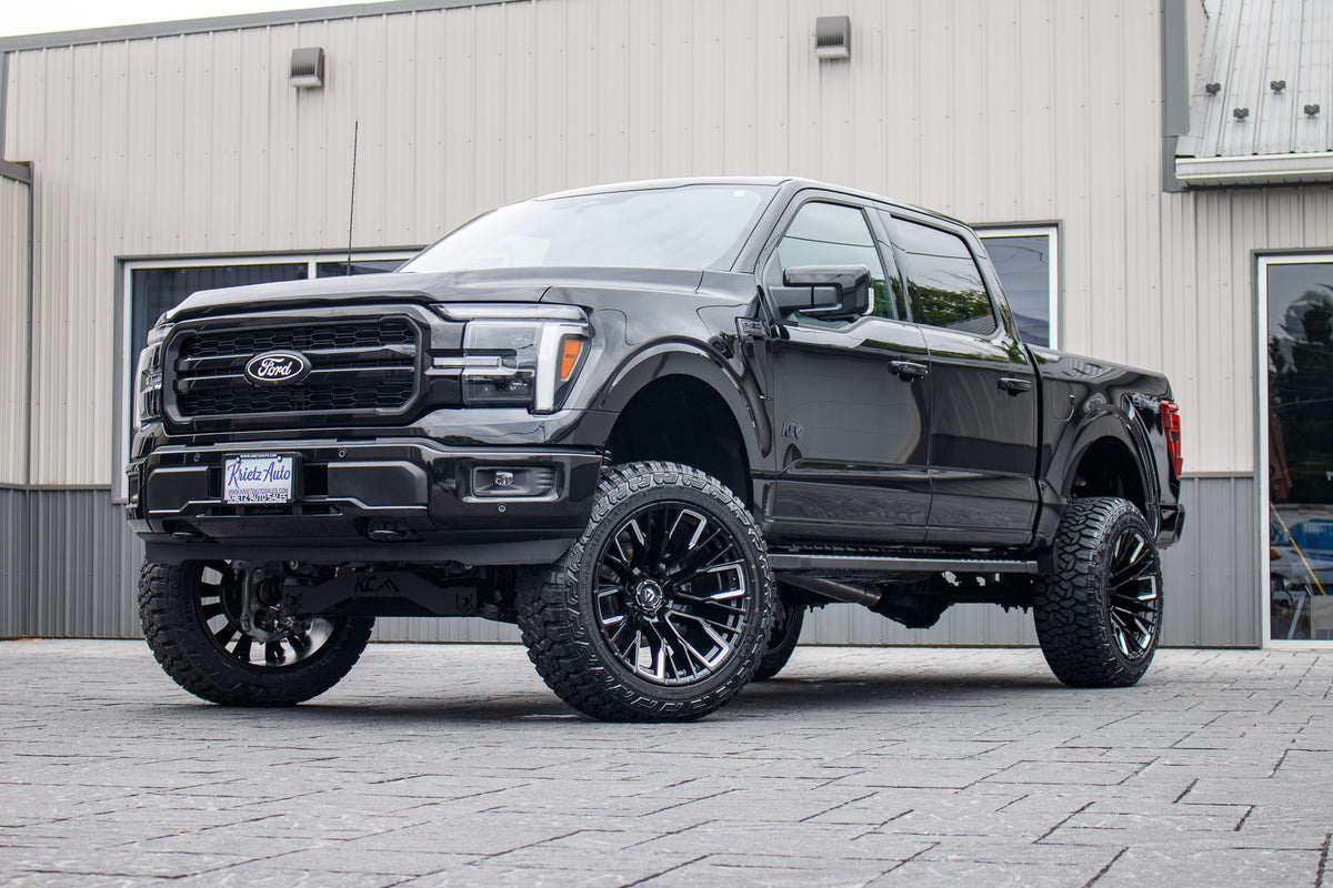 2026 Ford F-150 Lariat with a 6" Rough Country lift kit, 22x12 Fuel Rebar wheels, and 35" Fury Country Hunter R/T tires.