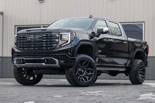 2024 GMC Sierra 1500 Denali Ultimate with a 6" Rough Country lift kit, 22x12 Fuel Twitch wheels, and 35" Fury Country Hunter R/T tires.