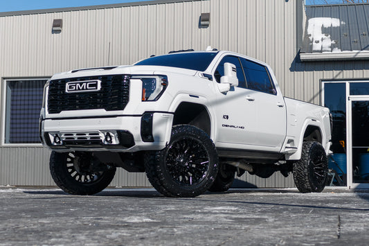 2024 GMC Sierra 2500 Denali Ultimate with a 5" BDS lift kit, 22x12 Fuel Strike wheels, and 37" Nitto Ridge Grappler tires.