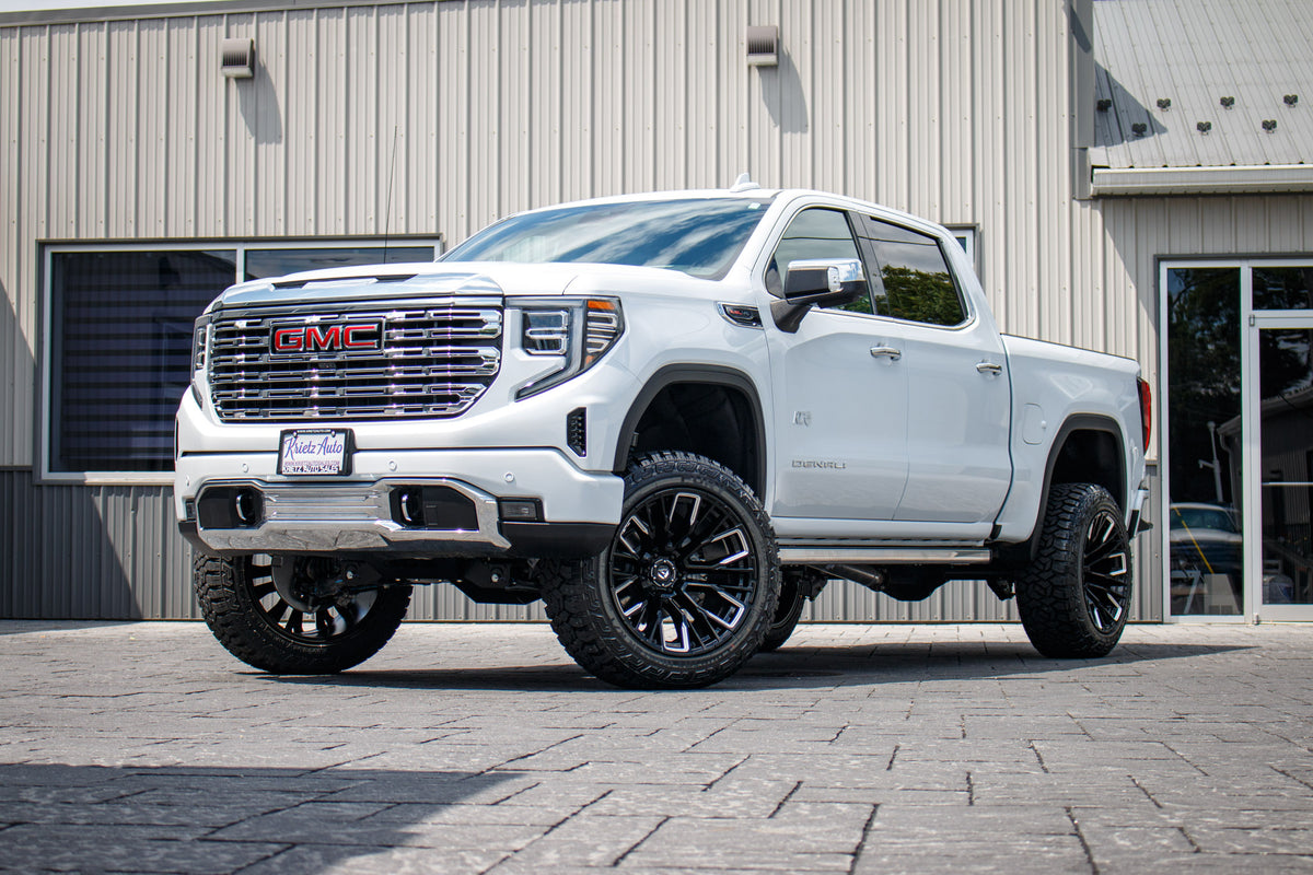 2026 GMC Sierra 1500 Denali with a 6" BDS lift kit, 22x12 Fuel Rebar wheels, and 35" Fury Country Hunter R/T tires.