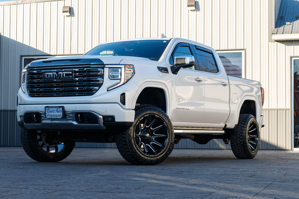 2024 GMC Sierra 1500 Denali Ultimate with a 6" Rough Country lift kit, 22x12 Fuel Super C wheels, and 35" Fury Country Hunter R/T tires.