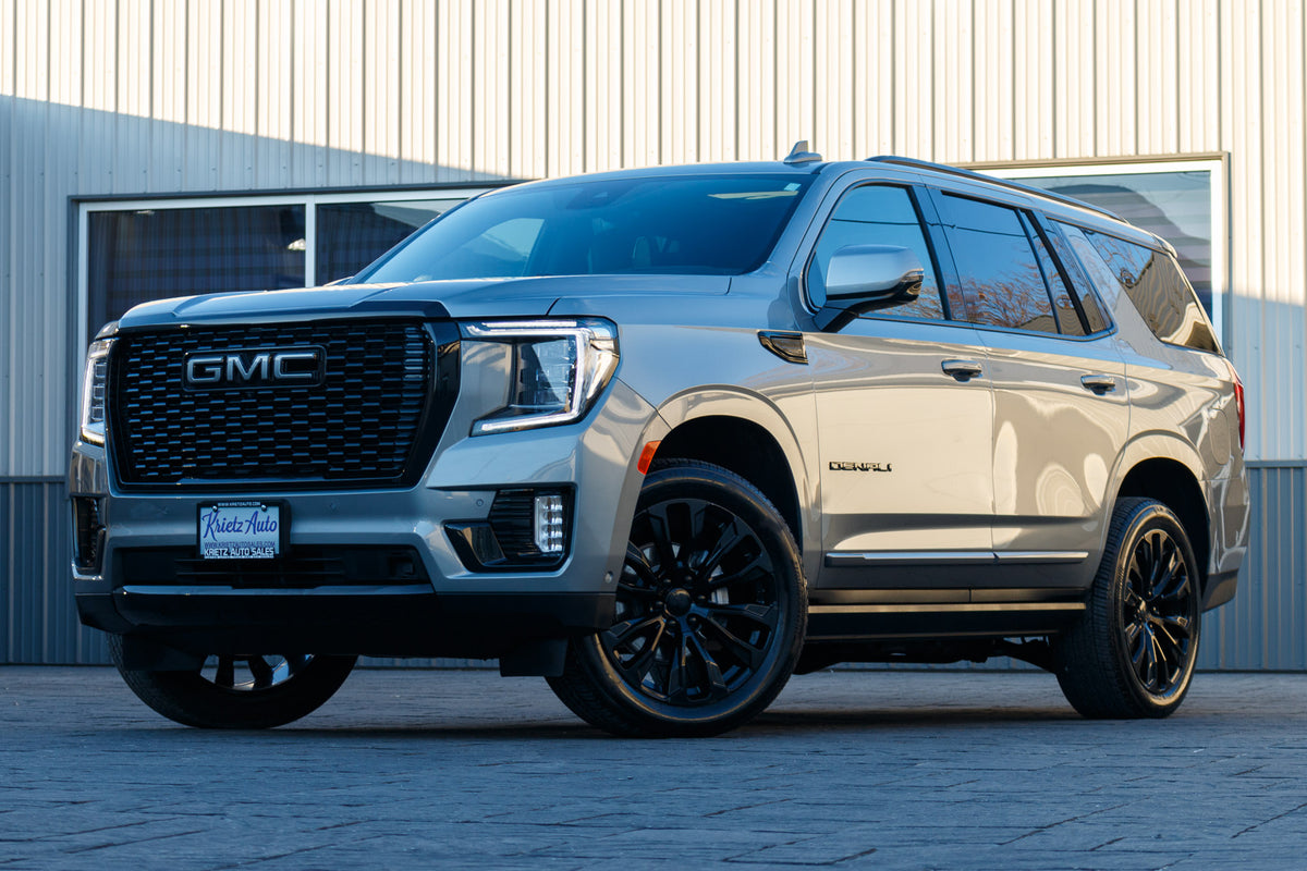 2024 GMC Yukon Denali Ultimate with GMC Factory suspension, 22x9 GMC Stock wheels, and Bridgestone Alenza tires.