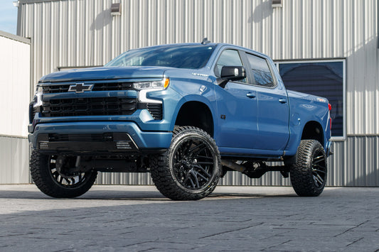 2024 Chevrolet Silverado 1500 RST with a 6" Rough Country lift kit, 22x12 TIS 554B wheels, and 35" Fury Country Hunter R/T tires.
