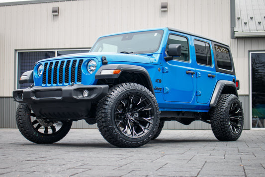 2024 Jeep Wrangler Sport with a 2.5" Rough Country lift kit, 22x12 Fuel Flame wheels, and 35" Fury Country Hunter R/T tires.