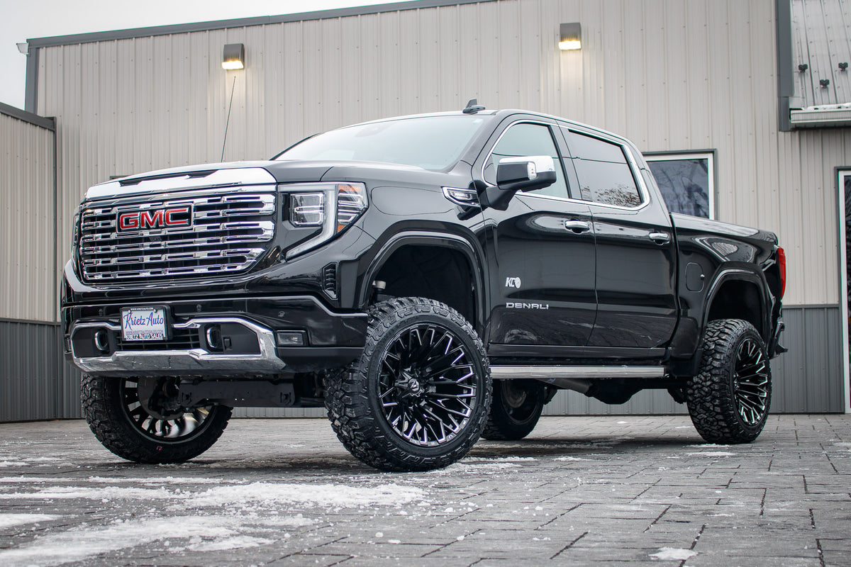 2024 GMC Sierra 1500 Denali with a 6" Rough Country lift kit, 22x12 Fuel Strike wheels, and 35" Fury Country Hunter R/T tires.