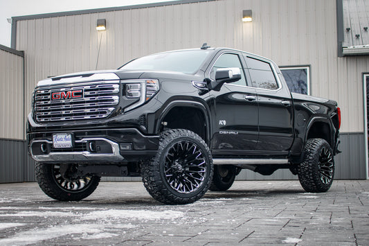 2024 GMC Sierra 1500 Denali with a 6" Rough Country lift kit, 22x12 Fuel Strike wheels, and 35" Fury Country Hunter R/T tires.