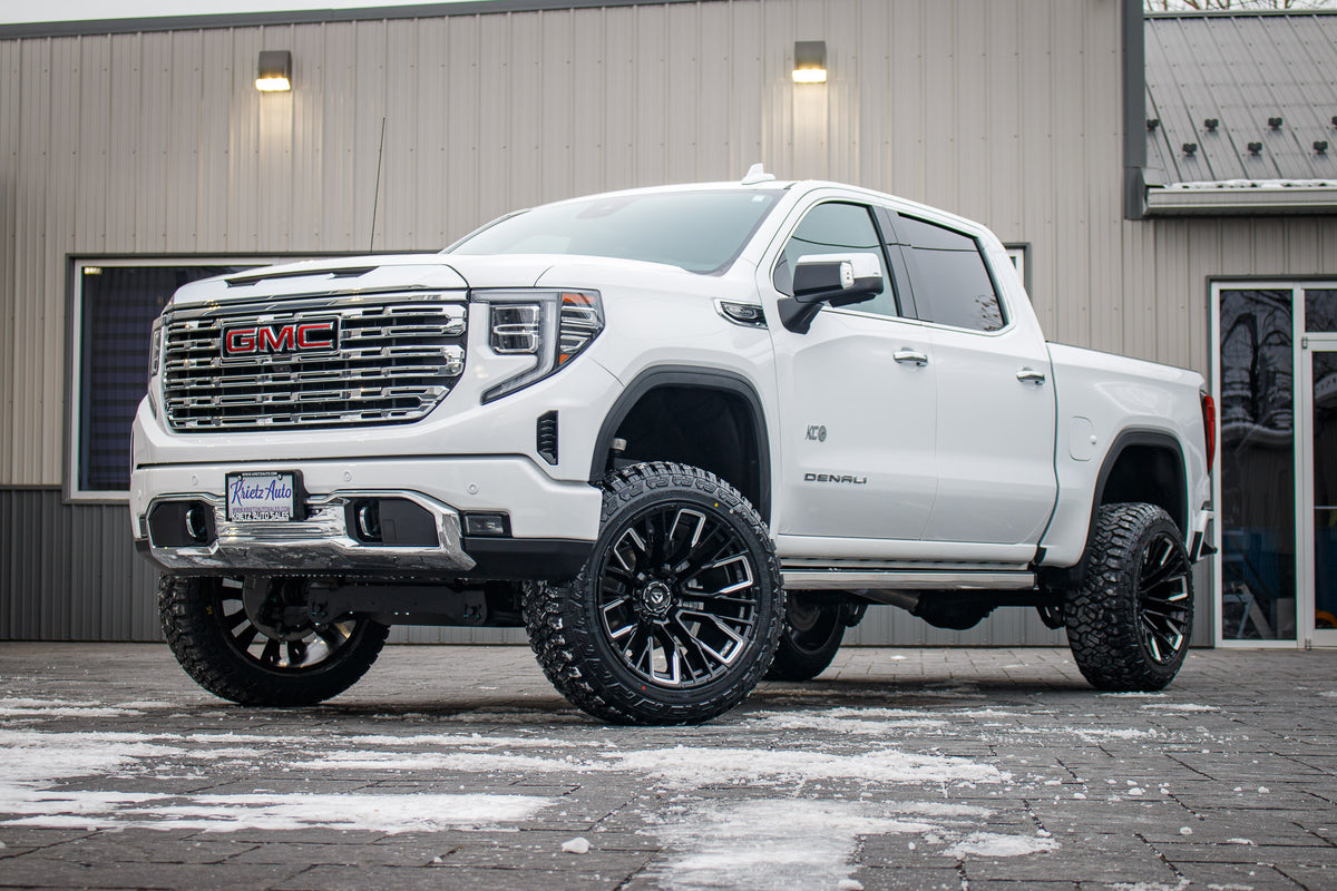 2022 GMC Sierra 1500 Denali with a 6" Rough Country suspension kit, 22x12 Fuel Rebar wheels, and 35" Fury Country Hunter R/T tires.