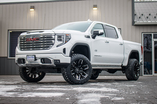 2022 GMC Sierra 1500 Denali with a 6" Rough Country suspension kit, 22x12 Fuel Rebar wheels, and 35" Fury Country Hunter R/T tires.