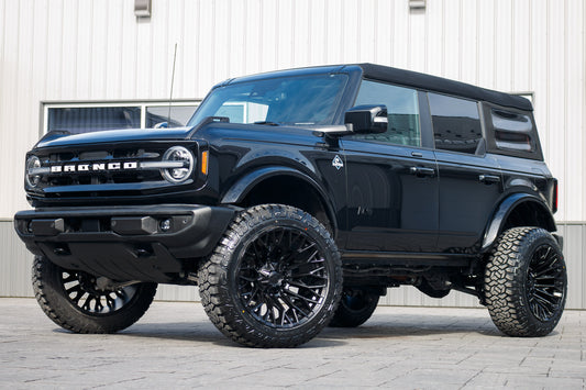 2023 Ford Bronco Outer Banks with a 3.5" Rough Country lift kit, 22x12 Fuel Strike wheels, and 35" Fury Country Hunter R/T tires.