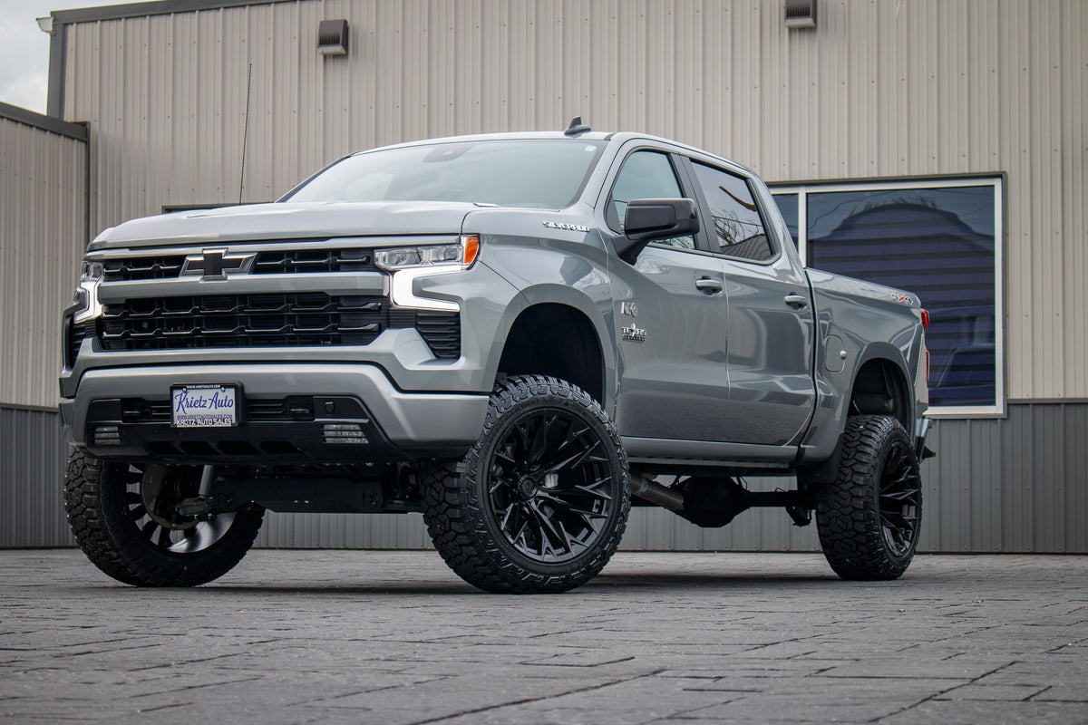 2023 Chevrolet Silverado 1500 RST with a 6" Rough Country lift kit, 22x12 Fuel Flame wheels, and 35" Fury Country Hunter R/T tires.