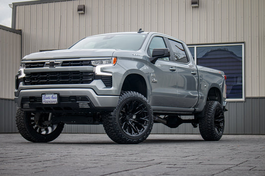 2023 Chevrolet Silverado 1500 RST with a 6" Rough Country lift kit, 22x12 Fuel Flame wheels, and 35" Fury Country Hunter R/T tires.