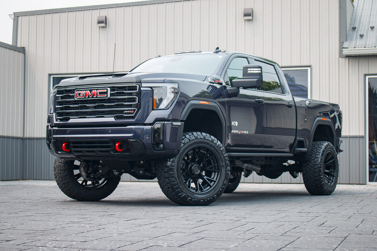 2026 GMC Sierra 2500 AT4 with a 5" BDS lift kit, 22x12 Fuel Catalyst wheels, and 37" Nitto Ridge Grappler tires.