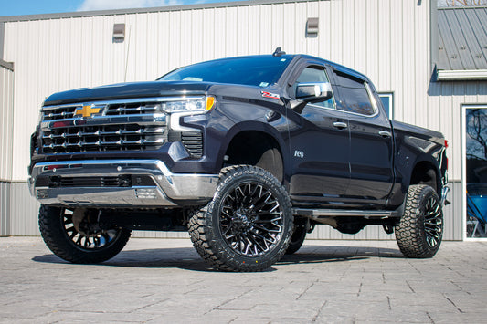 2023 Chevrolet Silverado 1500 LTZ with a 6" Rough Country lift kit, 22x12 Fuel Strike wheels, and 35" Fury Country Hunter R/T tires.