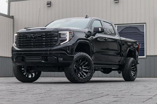 2024 GMC Sierra 1500 Denali with a 6" Rough Country lift kit, 22x12 Fuel Blitz wheels, and 35" Fury Country Hunter R/T tires.
