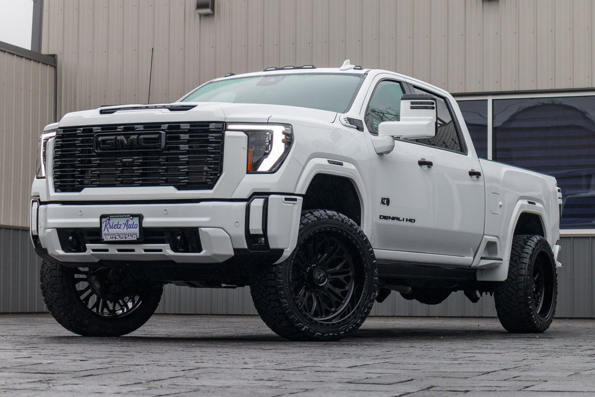 2025 GMC Sierra 3500 with a 3" Cognito leveling kit, 24x12 American Force Intrepid wheels, and 315/45 Nitto Ridge Grappler tires.