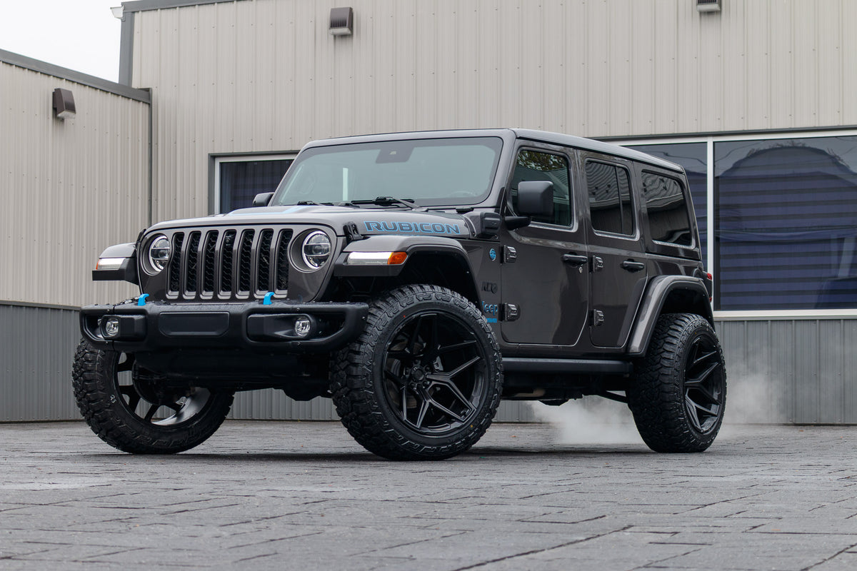 2021 Jeep Wrangler with Jeep Stock suspension, 22x12 Fuel Flux wheels, and 35" Fury Country Hunter R/T tires.