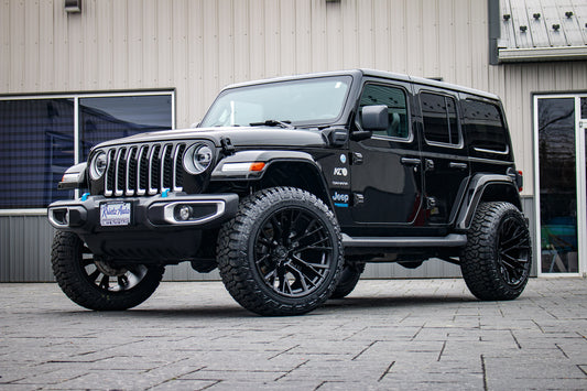 2022 Jeep Wrangler Unlimited Sahara 4XE with a 2.5" Rough Country lift kit, 22x12 Fuel Rebar wheels, and 35" Fury Country Hunter R/T tires.