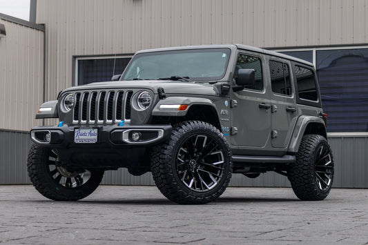 2022 Jeep Wrangler Unlimited Sahara 4XE with a 2.5" Rough Country lift kit, 22x12 Fuel Rebar wheels, and 35" Fury Country Hunter R/T tires.