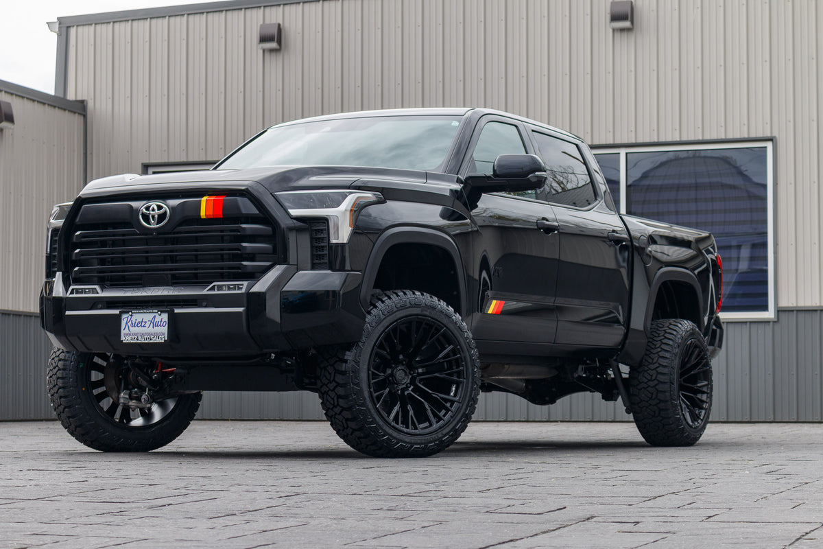 2025 Toyota Tundra Limited with a 6" Rough Country lift kit, 22x12 Fuel Rebar wheels, and 35" Fury Country Hunter R/T tires.