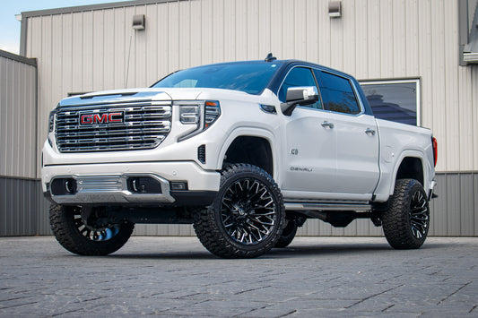2024 GMC Sierra 1500 Denali with a 6" Rough Country lift kit, 22x12 Fuel Strike wheels, and 35" Fury Country Hunter R/T tires.