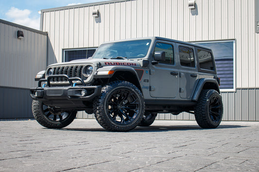 2023 Jeep Wrangler with Jeep Stock suspension, 22x12 Fuel Flame wheels, and 35" Fury Country Hunter R/T tires.