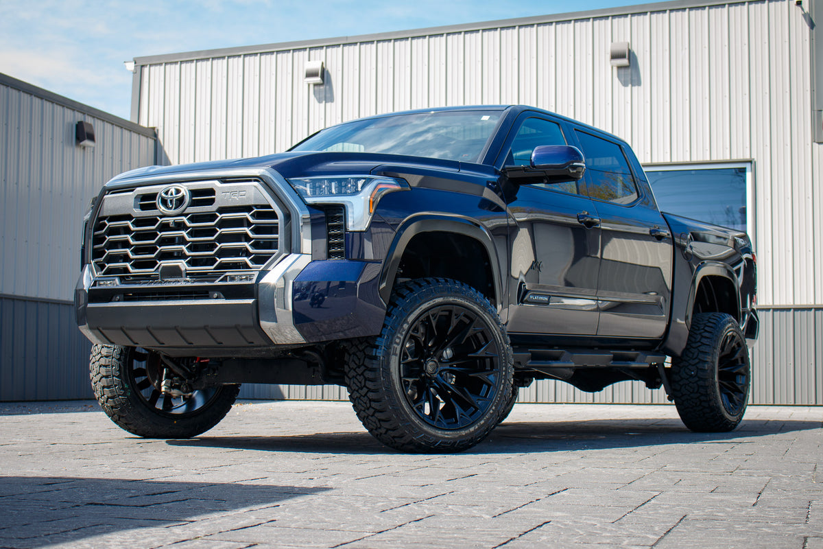 2024 Toyota Tundra Limited with a 6" Rough Country lift kit, 22x12 Fuel Flame wheels, and 35" Fury Country Hunter R/T tires.