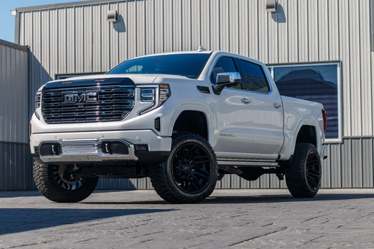 2025 GMC Sierra 1500 Denali Ultimate with a 6" Rough Country lift kit, 22x12 Fuel Typhoon wheels, and 35" Fury Country Hunter R/T tires.