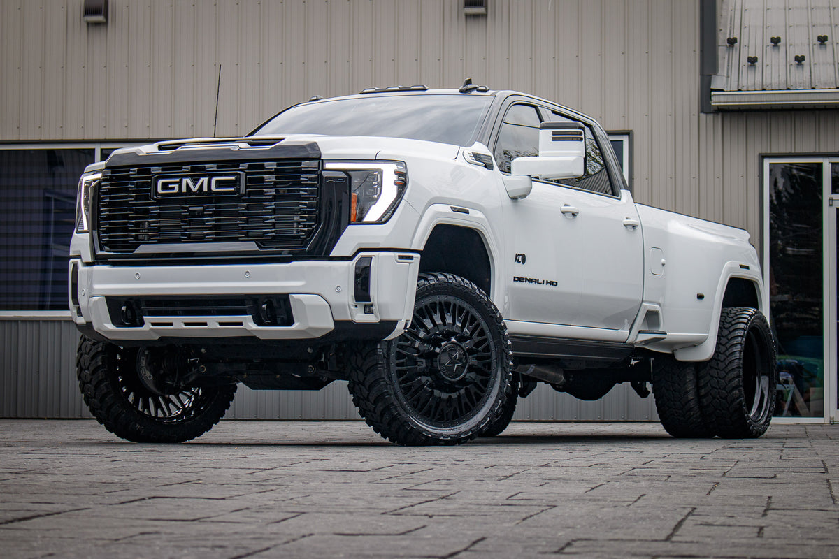 2025 GMC Sierra 3500 Denali Ultimate with a 4" CST lift kit, 26x8.25 American Force Business wheels, and 37" AMP Terrain Attack M/T A tires.