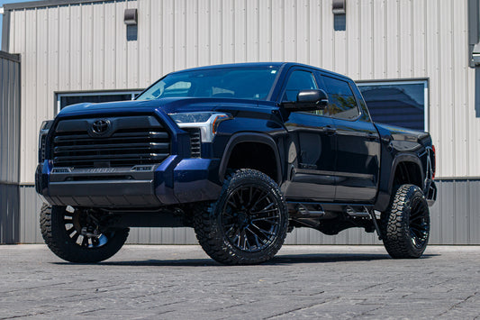 2024 Toyota Tundra SR with a 6" Rough Country lift kit, 22x12 Fuel Rebar wheels, and 35" Fury Country Hunter R/T tires.