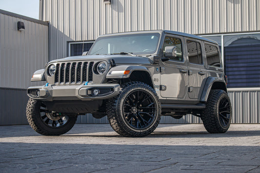 2022 Jeep Wrangler Unlimited Sahara 4XE with a 2.5" Rough Country lift kit, 22x12 Fuel Rebar wheels, and 35" Fury Country Hunter R/T tires.