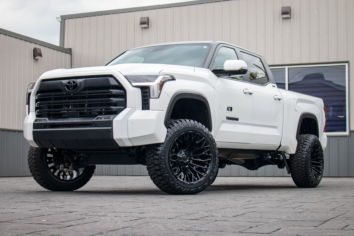 2024 Toyota Tundra SR5 with a 6" Rough Country lift kit, 22x12 Fuel Strike wheels, and 35" Fury Country Hunter R/T tires.