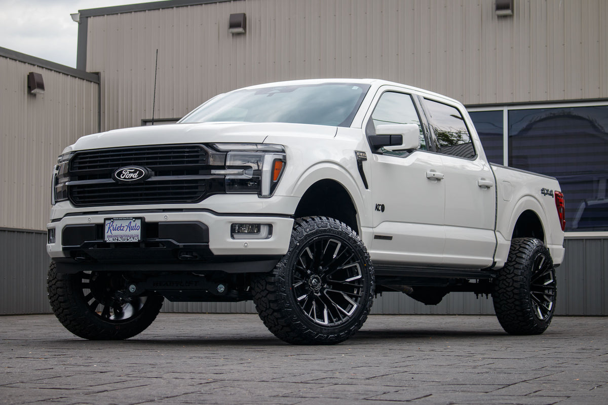 2024 Ford F-150 Platinum with a 6" ReadyLift lift kit, 22x12 Fuel Rebar wheels, and 35" fury Country Hunter R/T tires.