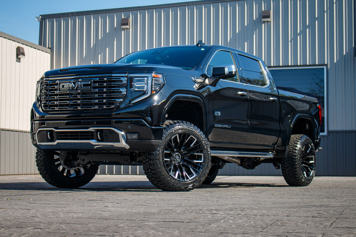 2025 GMC Sierra 1500 Denali Ultimate with a 6" Rough Country lift kit, 22x12 Fuel Rebar wheels, and 35" Fury Country Hunter R/T tires.